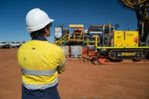 Geoscientist Liam watches the RoXplorer CT drilling platform at work.