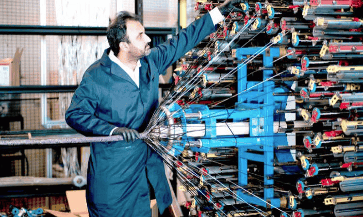 Dr Mazhar Peerzada working with the T4L dual-ring braider